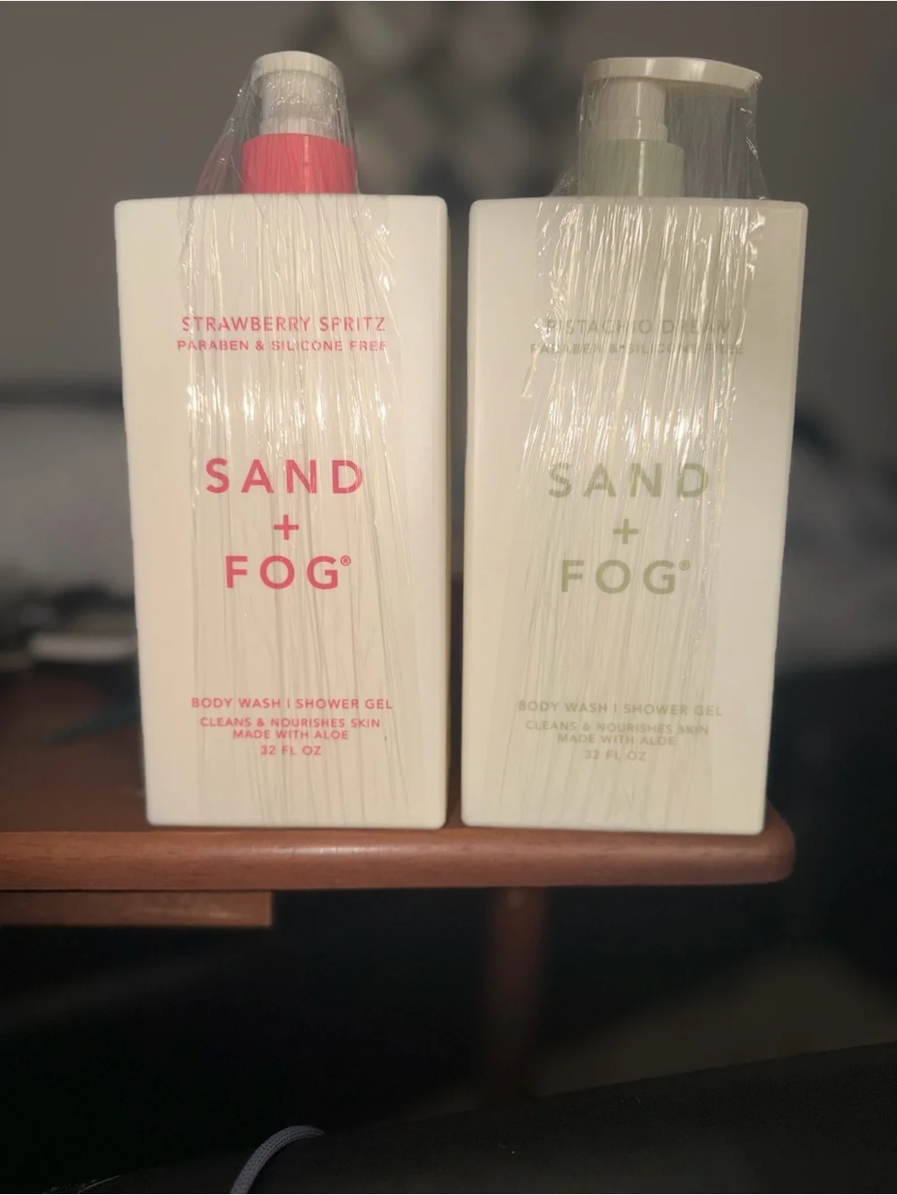 SAND + FOG Strawberry Spritz and Pistachio Dream body wash. 32 ounces each.